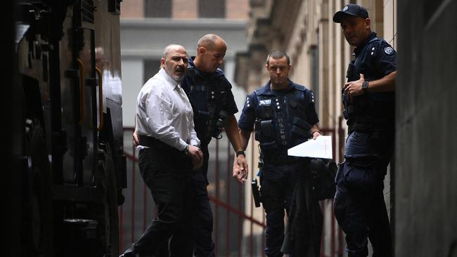 Tony Mokbel (left) arrives at the Supreme Court of Victoria in Melbourne in November. Picture: AAP