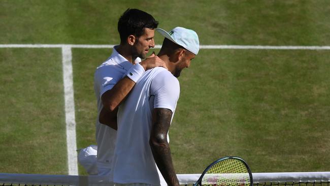 Serbia's Novak Djokovic (L) and Australia's Nick Kyrgios talk