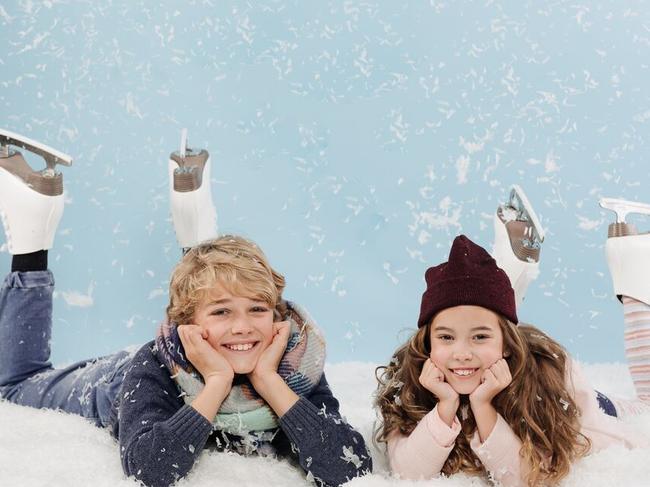 Darcy and Carlee getting ready for Eastland's ice skating rink.