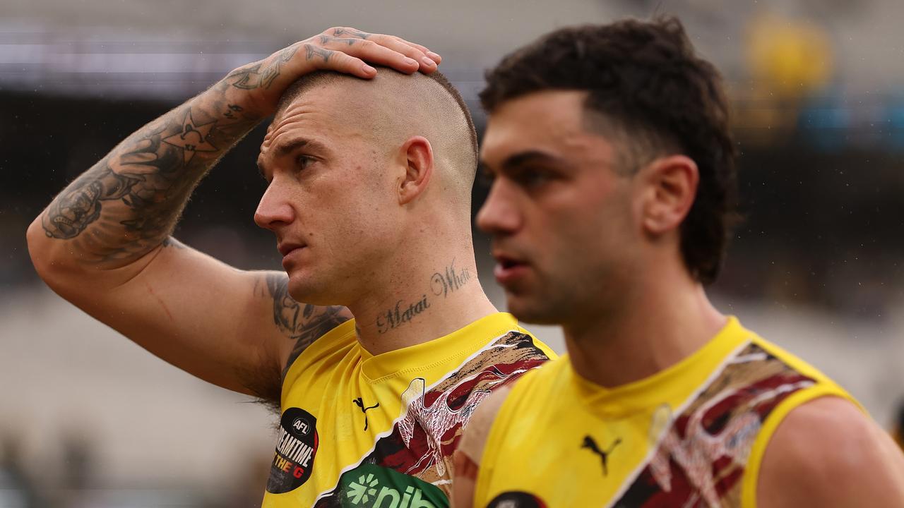 Dustin Martin and Tim Taranto walk off the MCG. Picture: Robert Cianflone/Getty Images