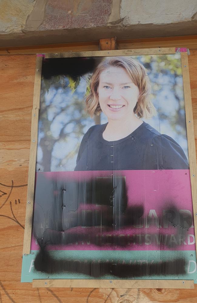 One of the damaged posters promoting Angela Carr.