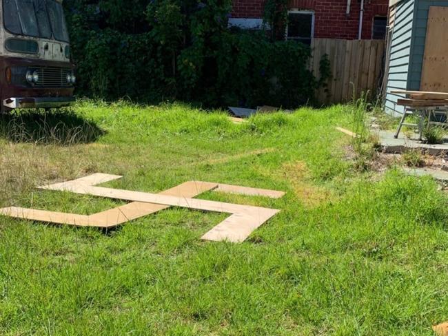 The Nazi Swastika was found in the backyard of a Caulfield rooming house.