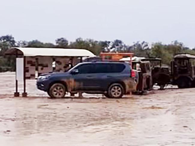 Four-wheel-drives waiting out the rain at Mungerannie Hotel. Picture: Facebook