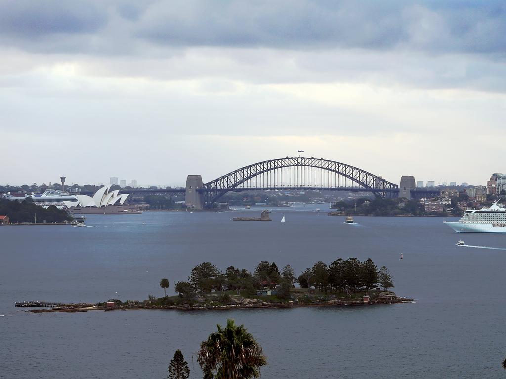 Pictured from Vaucluse is is the cruise ship Crystal Serenity which is unable to go under the Sydney Harbour Bridge as planned due to height calculation being wrong. Picture: Richard Dobson