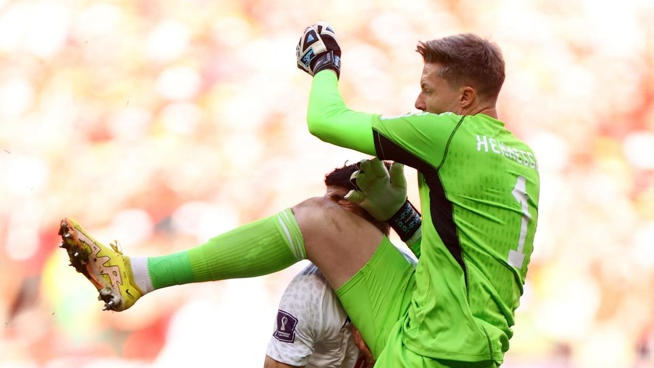 Wales' Wayne Hennessey fouls Iran's Mehdi Taremi and subsequently receives a red card and is sent off.