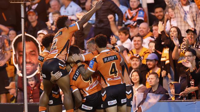 SYDNEY, AUSTRALIA - APRIL 27: Tallyn Da Silva of the Wests Tigers celebrates a try during the round eight NRL match between Wests Tigers and Cronulla Sharks at Leichhardt Oval, on April 27, 2025, in Sydney, Australia. (Photo by Darrian Traynor/Getty Images)