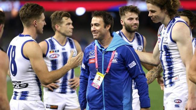 Scott celebrates the Kangaroos' win over the Bulldogs in what was his last game in charge. Picture: AAP