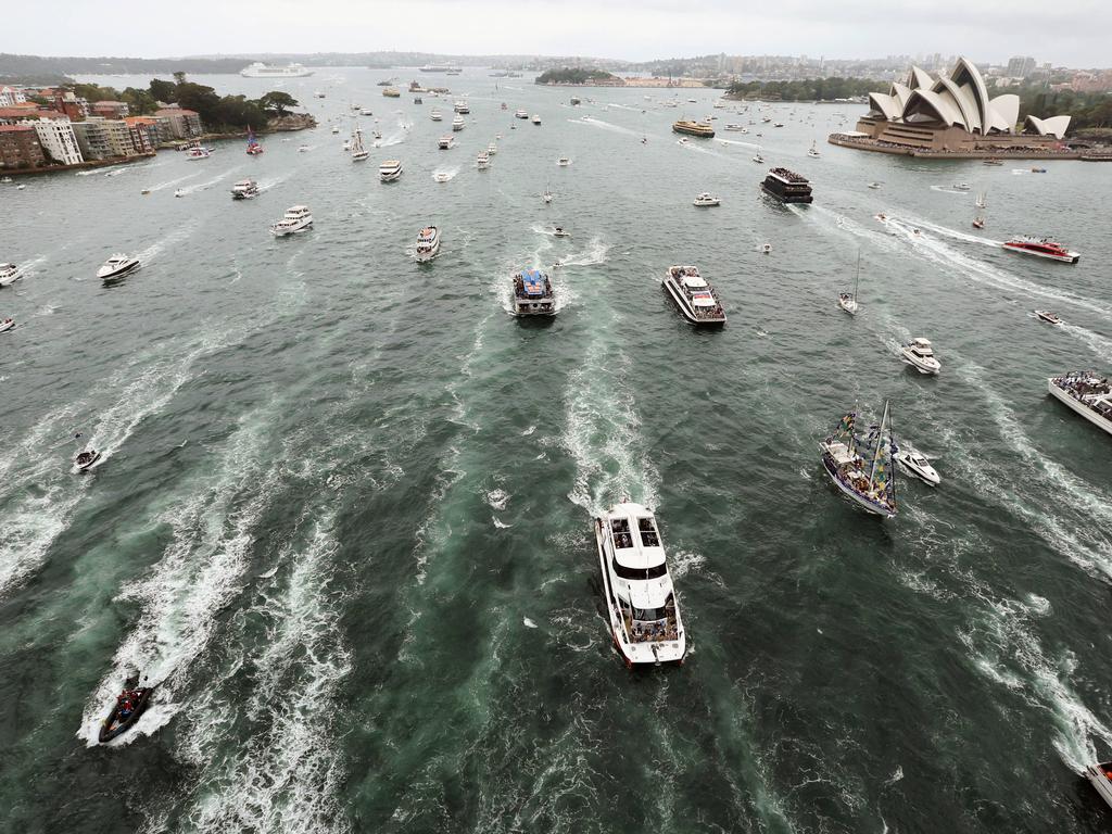 Pictured are spectator boats during the annual Sydney Ferry Race on Sydney Harbour on Australia Day 2017. Picture: Richard Dobson