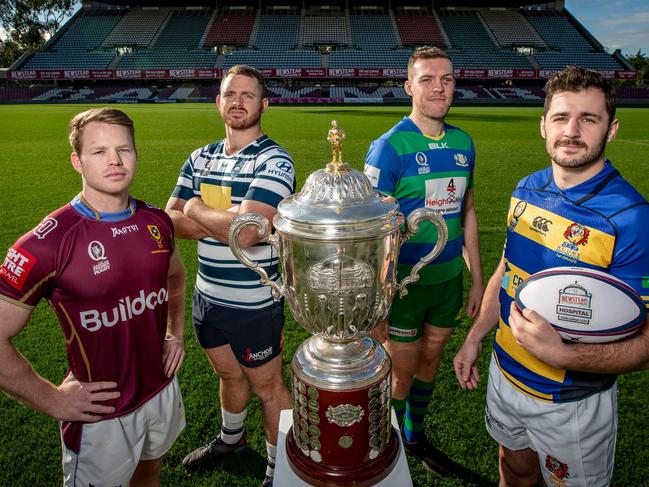 Club captains (from left) James Dalgleish (University), Tom Moloney (Brothers) Dan Gorman (GPS) and Tom Milosevic (Easts) eye the Hospital Cup on the eve of the Premier Rugby semi-finals at Ballymore. Photo by Brendan Hertel, QRU.