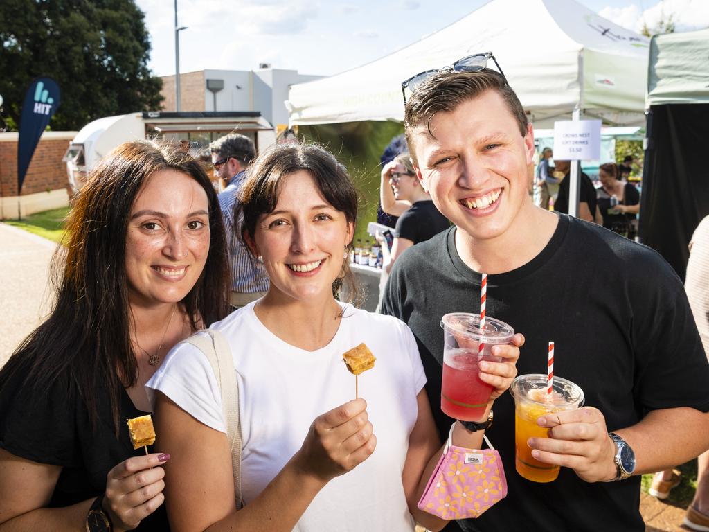 Sampling some of Melek's Baklava and More produce are (from left) Georgia Smith, Maddi Cross and Ben Brunner at Locals 4 Locals summer edition on the lawn of Empire Theatres, Friday, February 18, 2022. Picture: Kevin Farmer