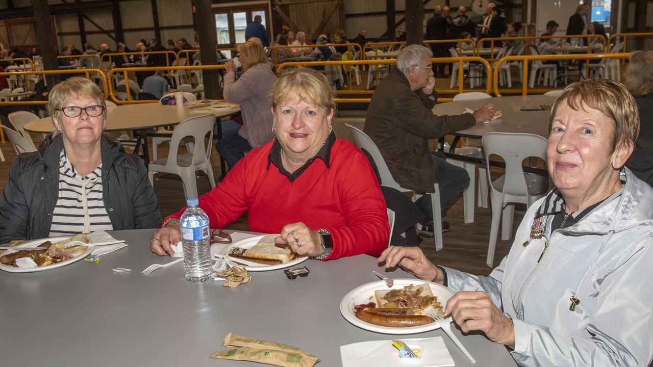 (from left) Jannine, Kathy and Anne Dobson enjoy the Gunfire breakfast at The Goods Shed on ANZAC DAY. Tuesday, April 25, 2023. Picture: Nev Madsen.