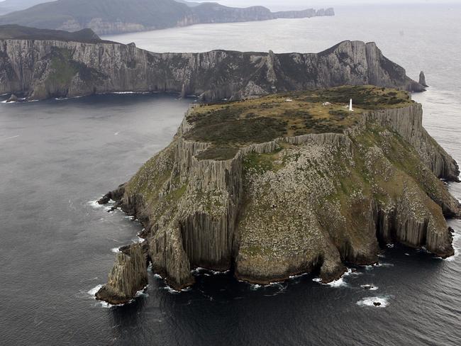 Aerial, Tasman Island, visit to the island by Bill Addison (69) of Western Australia, the grandson of Leslie Johnston a famous lighthouse keeper in Tasmania who was based at Tasman Island