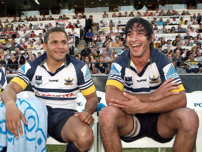 NRL - North Queensland Cowboys vs New Zealand Warriors @ Dairy Farmers stadium -Johnathan Thurston (R) takes a rest on the bench beside Matt Bowen (L) near the end of the game