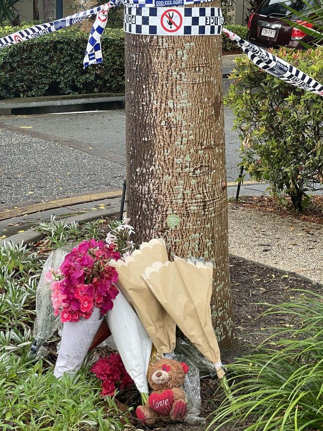 Floral tributes and toys have been left around Emerald Lakes where Sophie Wang died.