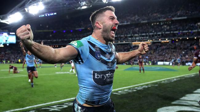 NSW's James Tedesco celebrates winning try with Mitchell Pearce during Game 3 of the State of Origin series between NSW Blues and Queensland at ANZ Stadium, July 10, 2019. Picture. Phil Hillyard