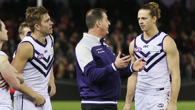 Dockers coach Ross Lyon talks to captain Nat Fyfe.