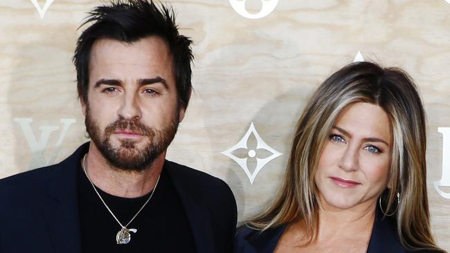 Justin Theroux, left, and Jennifer Aniston claim they have been on the receiving end of a campaign of harassment by their elderly neighbour. Picture: Francois Mori/AP