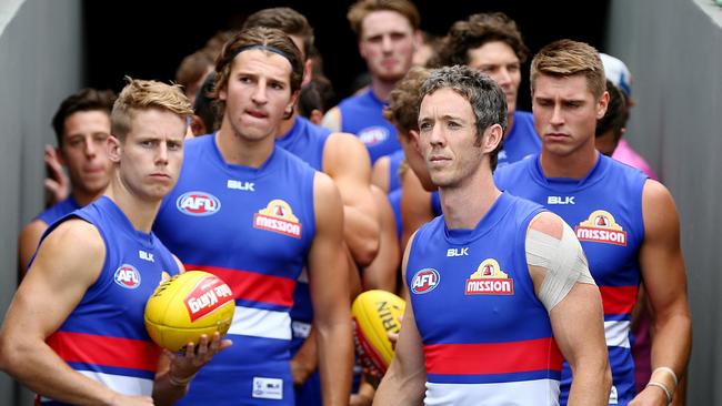 Robert Murphy leads the Bulldogs out for the first time as captain. Picture: Michael Klein