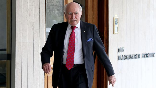 Former prime minister John Howard leaving The Australian Club. Picture: Jane Dempster