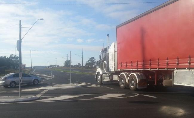 There was little evidence of last night's crash at the junction of Warrego Hwy and Forest Hill - Fernvale road this morning. Picture: Derek Barry