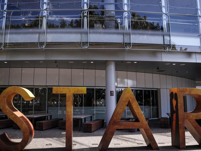 A sign stands outside The Star casino and event centre in Sydney on September 2, 2024. Troubled resort and casino operator Star Entertainment was temporarily delisted from the Australian Securities Exchange on September 2 after failing to post its annual financial results. (Photo by DAVID GRAY / AFP)