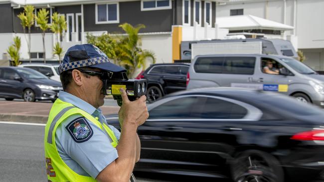 Police officers conducting a road-safety operation in Varsity Lakes. Picture: Jerad Williams