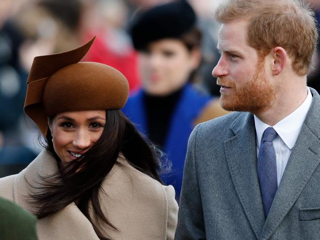 Meghan Markle with Prince Harry. Picture: AFP/Adrian Dennis