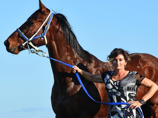 Gold Coast horse trainer Tracy Timbery on the Gold Coast Turf Club track with horse Road To The Bay.  Picture: John Gass