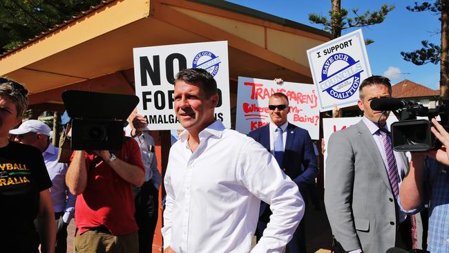 The Premier was mobbed by anti-amalgamation protesters at a recent event. Picture: Braden Fastier