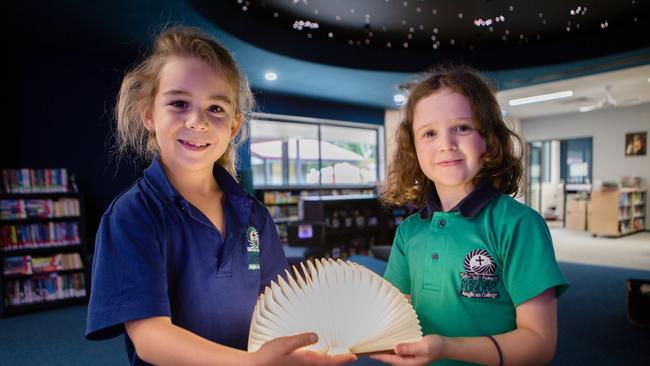 Matthew Flinders Anglican College students Holly Chacon and Lily Hogan in the Wonderarium building which was completed in 2021.