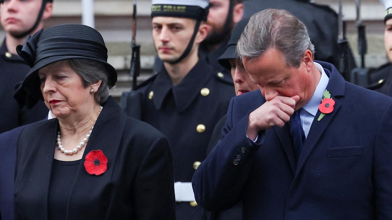 David Cameron with fellow former PM Theresa May during a Remembrance Sunday service this past weekend. Picture: Toby Melville/Getty Images