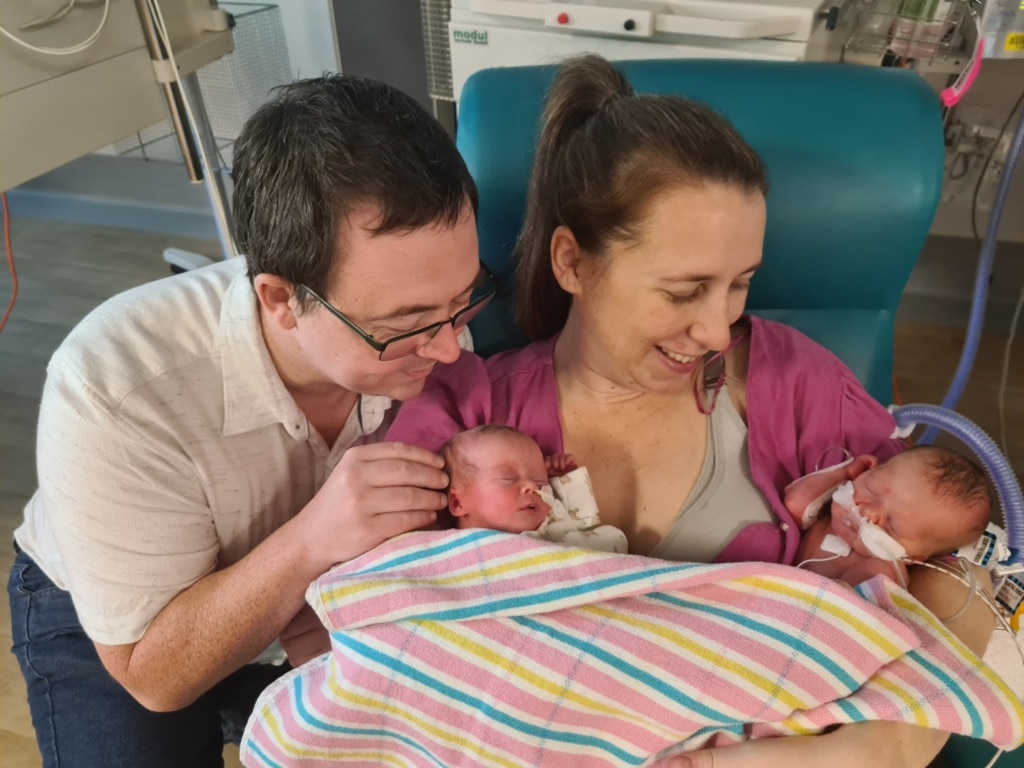 Lee and Marni Cochrane with Poppy and Billie in hospital.