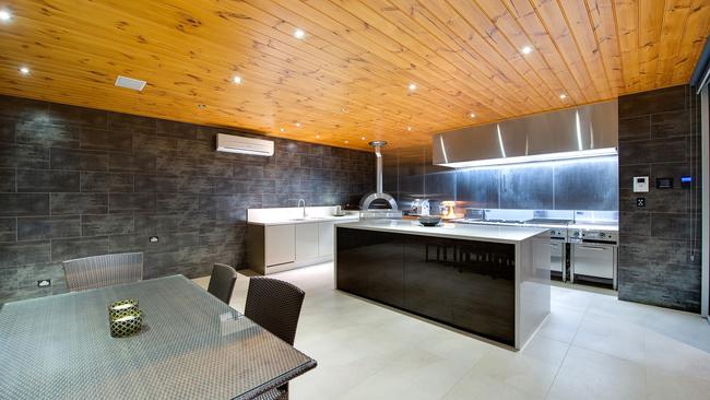 With an outdoor kitchen this stunning you won’t want to cook inside at all …