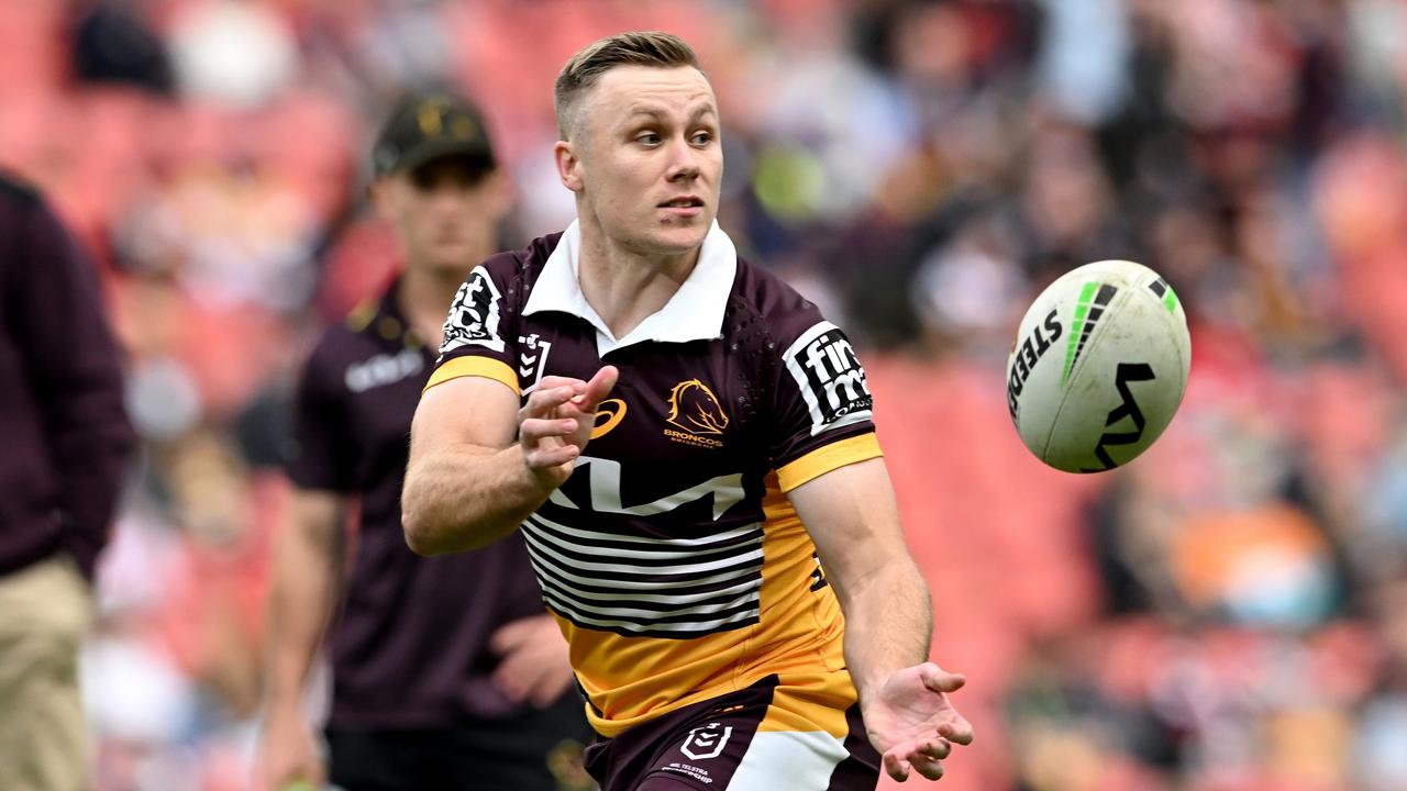 BRISBANE, AUSTRALIA - JULY 10: Billy Walters of the Broncos passes the ball during the warm up before the round 17 NRL match between the Brisbane Broncos and the St George Illawarra Dragons at Suncorp Stadium, on July 10, 2022, in Brisbane, Australia. (Photo by Bradley Kanaris/Getty Images)