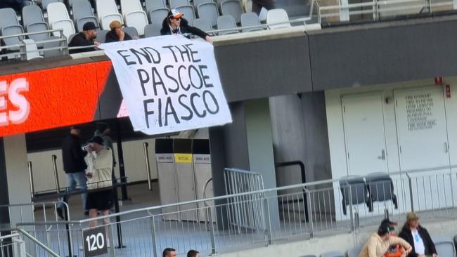 A sign criticising Wests Tigers CEO Justin Pascoe has been removed by security at Commbank Stadium. Picture: @Tiger2047 on Twitter/X.