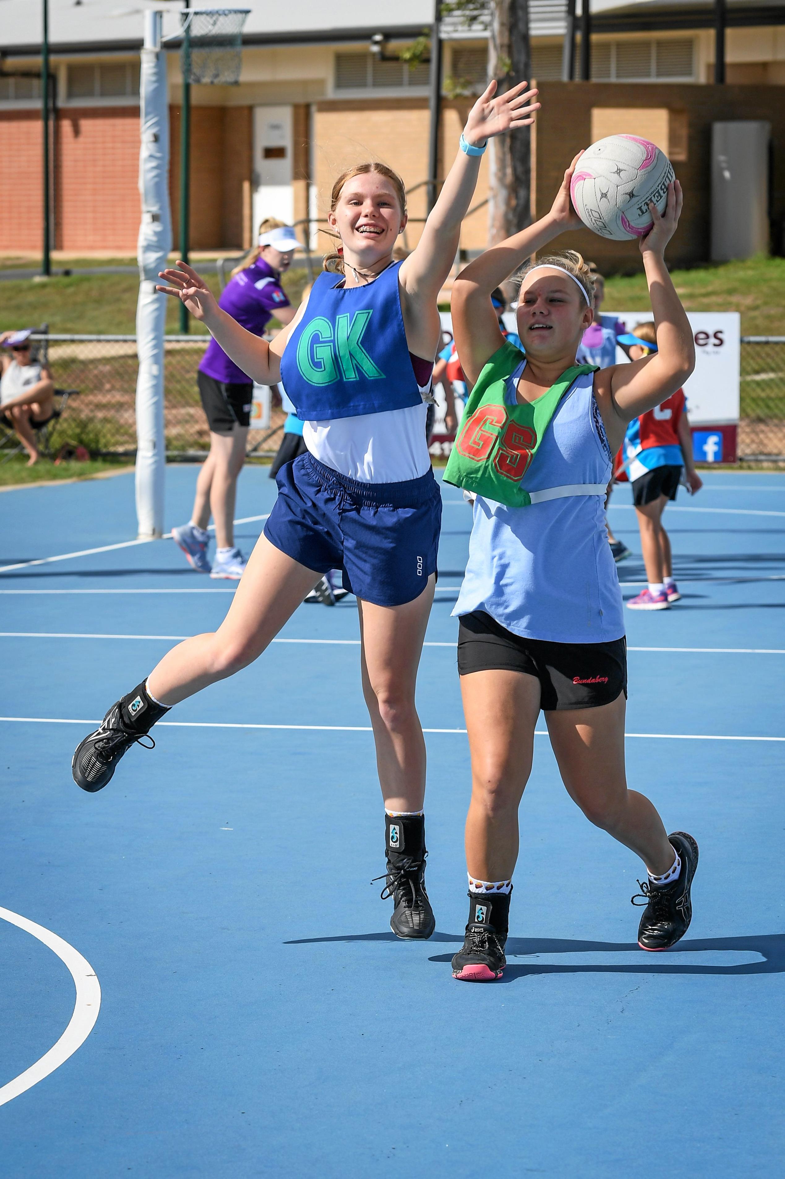 Tyla Royan passes while Elyse Packwood attempts to intercept. Picture: Brian Cassidy