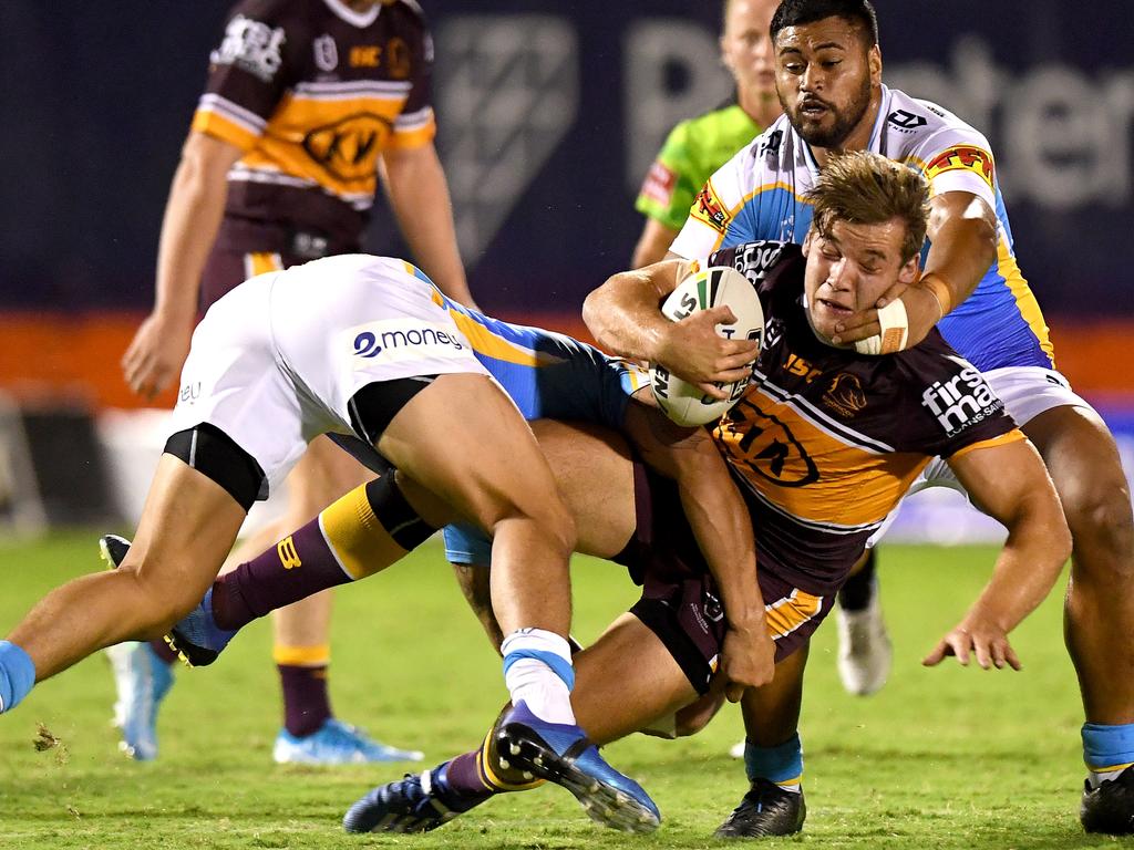 Patrick Carrigan (ball) was immense in the trial match against the Titans. Picture: Bradley Kanaris/Getty Images