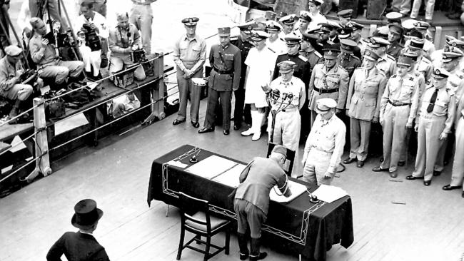 USA armed forces leader Supreme Allied Commander General Douglas MacArthur watching the official Japanese surrender ceremony aboard USS Missouri ship docked in Tokyo Bay On September 2, 1945.