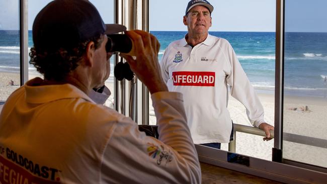 veteran Gold Coast lifeguards, Peter Ball (sitting) and Anthony Lunney on duty. Picture: Jerad Williams