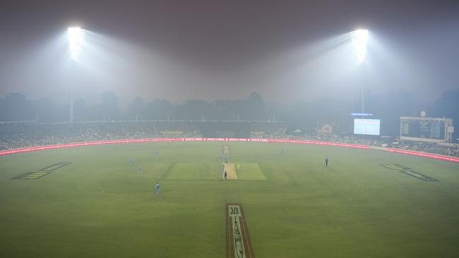 Smoke haze disrupted play during a Big Bash League match at Manuka Oval in Canberra. Picture: AAP Image/Lukas Coch