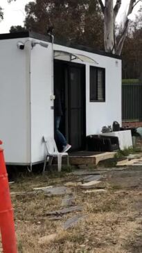 A man at the site of the cancelled Russian embassy