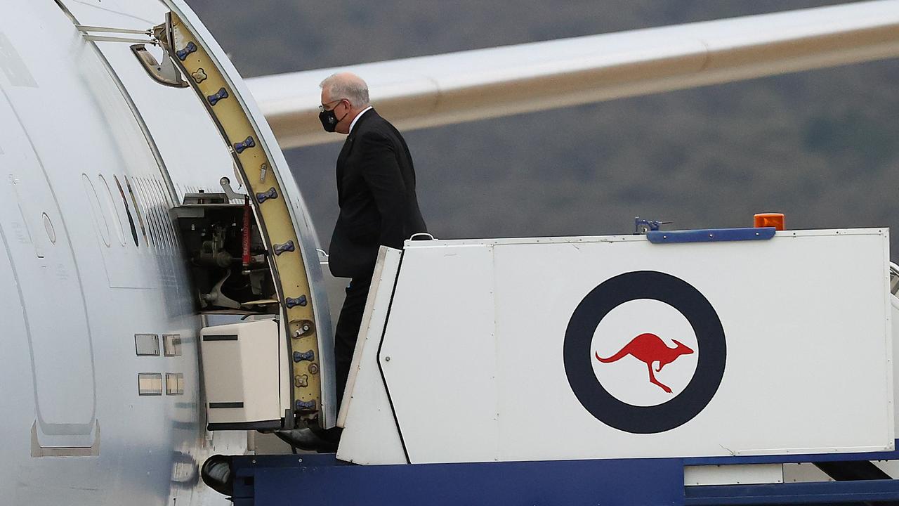 Prime Minister Scott Morrison boarded a RAAF aircraft in Canberra to attend the COP 26 UN Climate Change Conference in Glasgow, UK. Picture: NCA NewsWire / Gary Ramage