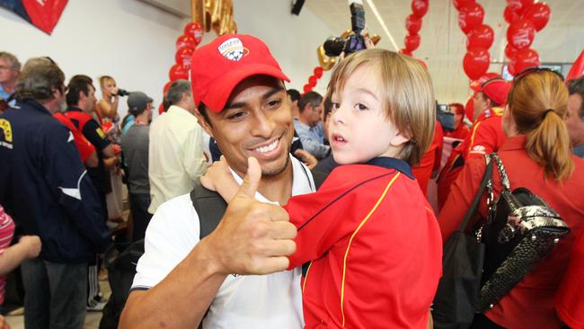 Adelaide United’s Cassio with son Bernardo Oliveira in 2008. Bernardo has just signed a scholarship deal with Melbourne City.