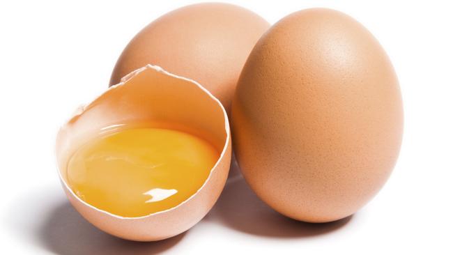 A group of victims was bizarrely egged before they were robbed.