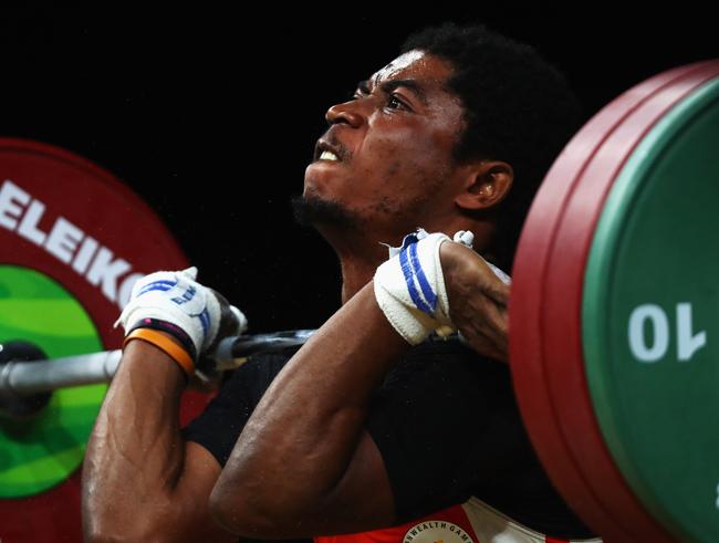 Weightlifter Olivier Heracles Matam Matam of Cameroon competes at the Gold Coast 2018 Commonwealth Games abefore his disappearance. Picture: Dean Mouhtaropoulos/Getty Images