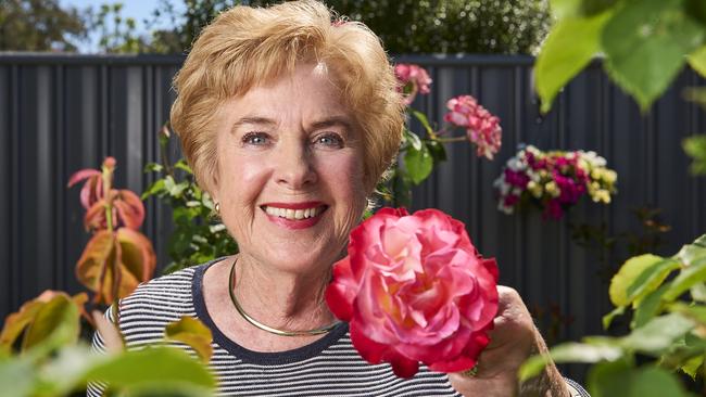 Sandy Mojsish with her roses at home in Royal Park, after winning best rose. Picture: Matt Loxton