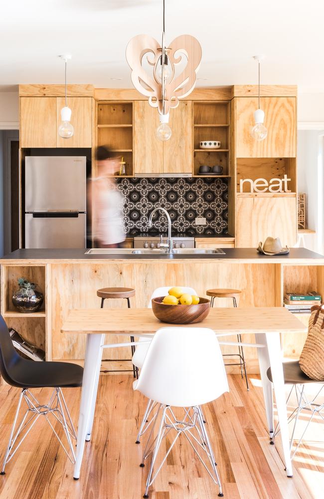 The kitchen is a timber masterpiece. Picture: NATALIE MENDHAM