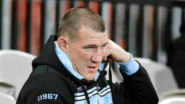 Paul Gallen of the Sharks sits the game out after suffering an injury.