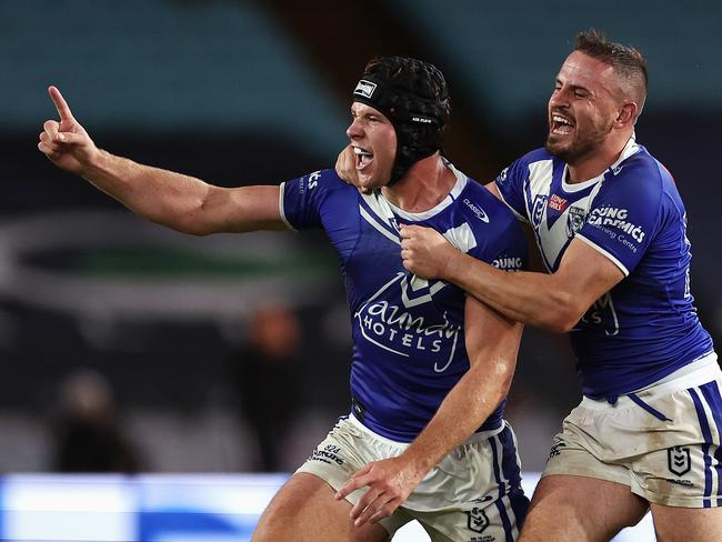 Matt Burton celebrates kicking the winning field goal. Picture: Getty Images