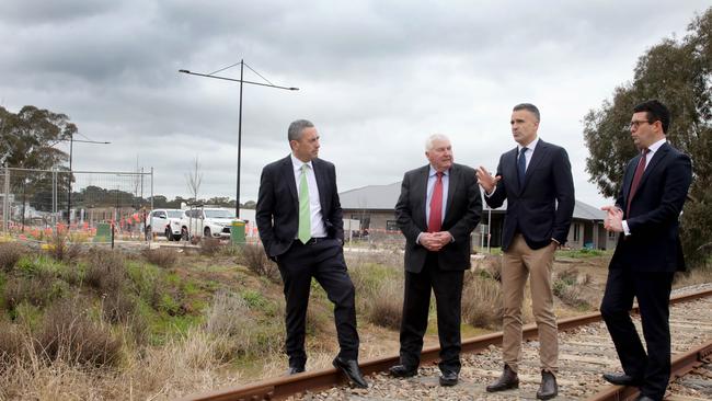 Transport and Infrastructure Minister Tom Koutsantonis, Mount Barker Mayor David Leach, Premier Peter Malinauskas and Member for Kavel Dan Cregan at the Heysen Boulevard Rail Crossing. Picture Dean Martin